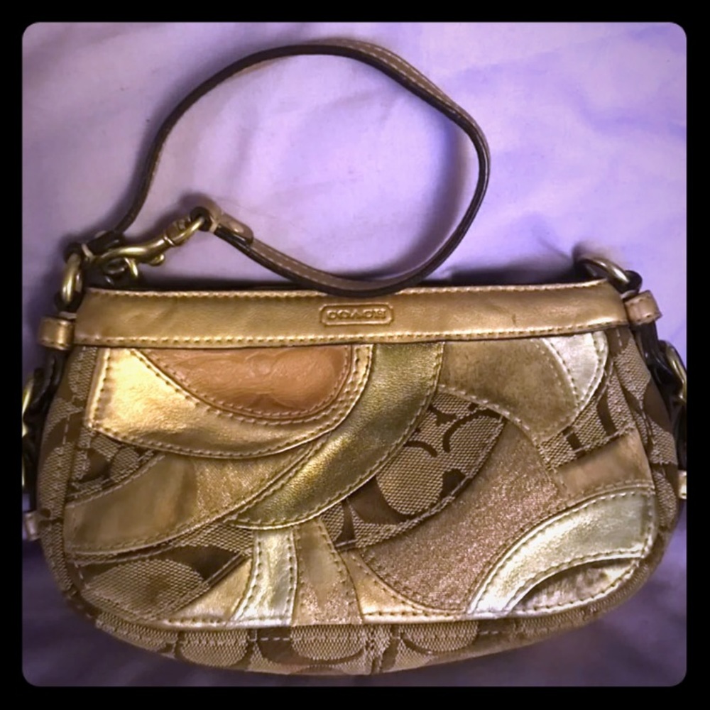 Gold patchwork wristlet coach